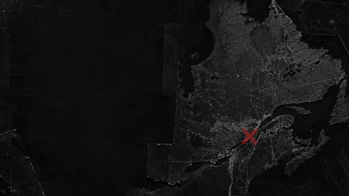 Dark map of Quebec marked with a red X.